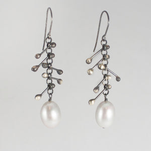 Grey pearl spiked earrings